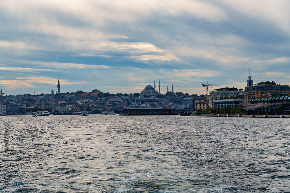 view from a pleasure boat on the Bosphorus and the cityscape of Istanbul, Turkey, the architecture of the city, a popular tourist destination. view from a pleasure boat on the Bosphorus and the cityscape of Istanbul, Turkey, the architecture of the city, a popular tourist destination.