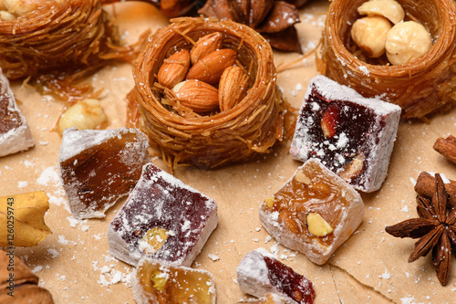 Sweet food Turkish delight on wooden background, assorted locum and candy for decorated backdrop photo