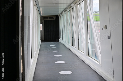 deserted finger bridge to plane boarding
