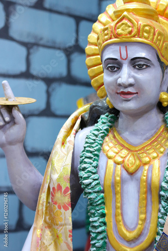 God Vishnu or Krishna with the weapon Sudarshana Chakra in his hand. photo