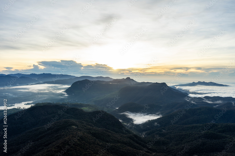 Obraz premium Sunrise at Adam's Peak, a famous religious pilgrimage site