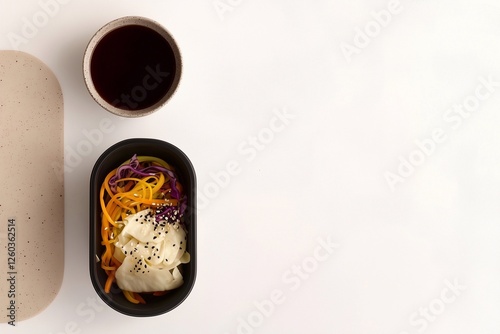 Grab-and-go container with a fresh Asian salad featuring cabbage, carrots, sesame, and teriyaki sauce. A vibrant, healthy, and delicious meal perfect for a quick and nutritious bite. Generative AI. photo