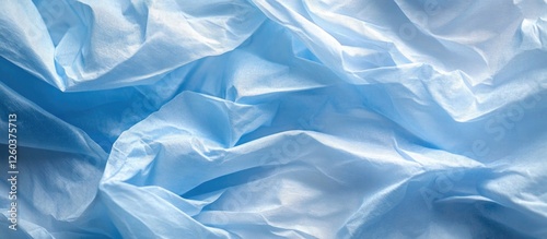 Wallpaper Mural Light blue crumpled tissue paper texture with soft patterns and folds ideal for backgrounds and creative design projects. Torontodigital.ca