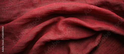 Textured red fabric background ideal for design projects and artistic compositions showcasing rich colors and intricate textile details.