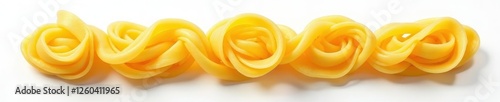 Neatly arranged fettuccine nest on white background , healthy, cooked, meal