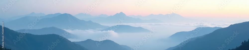 Obraz premium Mountain peaks shrouded in a thick layer of fog, mist, clouds