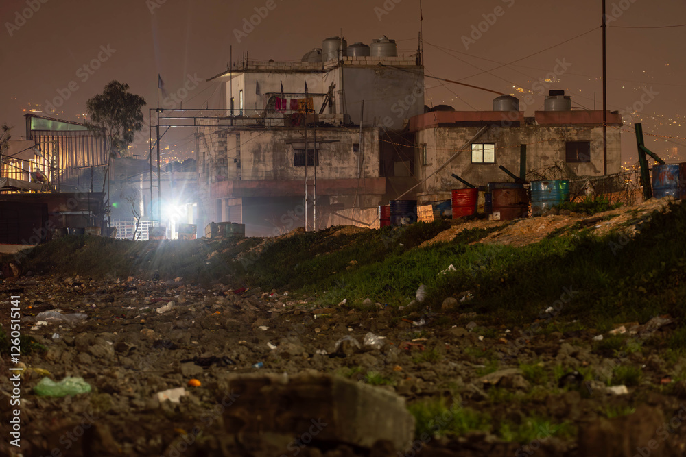Naklejka premium The night photo of the Palestinian refugee camp in Beirut in Hezbollah controlled area, Lebanon. 