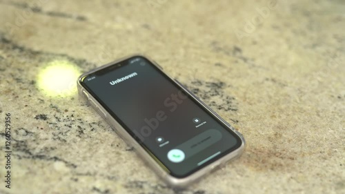 Unknown call from scammers on a mobile phone.