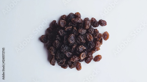 Dried Raisins Pile on White Background photo