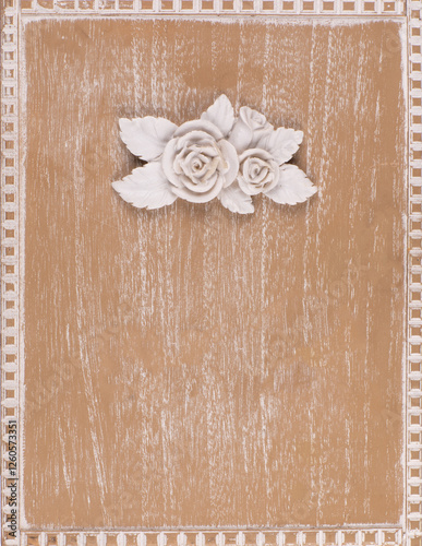 decorative wooden brown background with white wooden roses