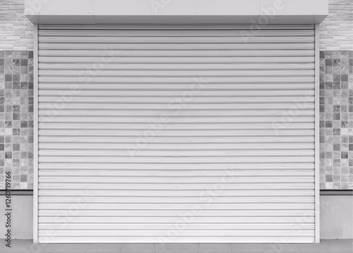 Closed steel shutter door of warehouse, storage or storefront for metal door background and textured.