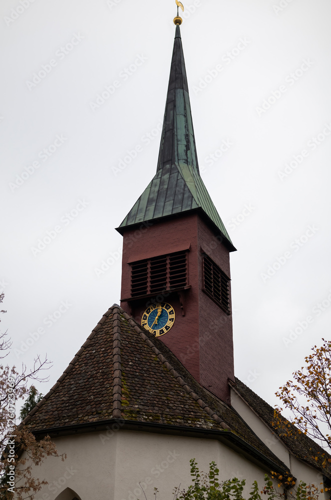 Picturesque Swiss Village Church in Autumn