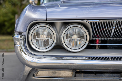 Close up of headlight retro classic car. Vintage effect style pictures. Classic car.