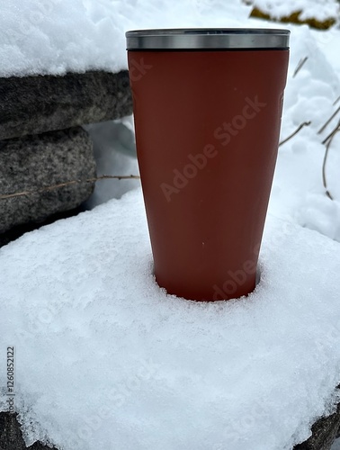 cup of coffee on snow