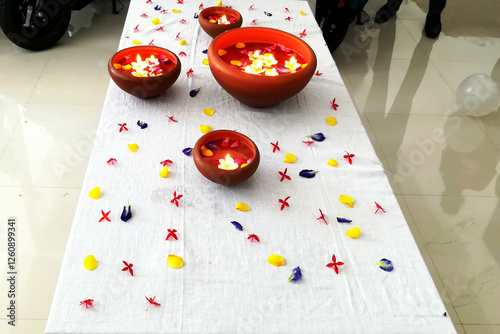candles lighting and flowers with pot