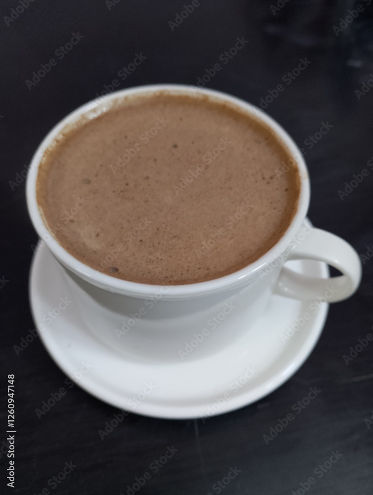 A great cup of coffee with milk in the morning A great cup of coffee with milk in the morning