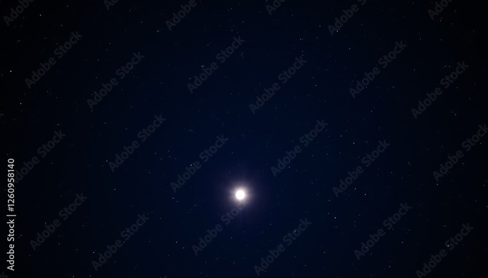 Fototapeta premium A bright celestial star shining in the dark night sky, creating a serene and peaceful cosmic scene.