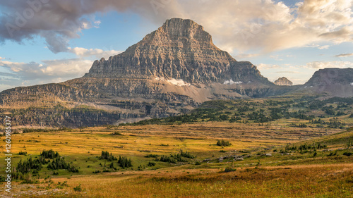 Fototapeta Naklejka Na Ścianę i Meble -  Glacier National Park - Golden hour view of Reynolds Mountain from the Hidden Lake trail from Logan Pass off the Going to the Sun Road