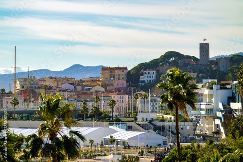 Obraz na płótnie Cannes beach and castle, buildings and palm trees, France w salonie