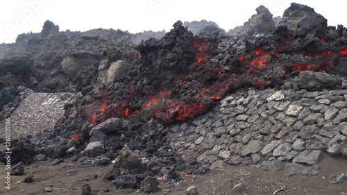 Lava from Pico do Fogo volcano approaches the town of Portela, Cape Verde.