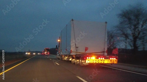 Driving Behind a Transport Truck With Oversized Load on Highway