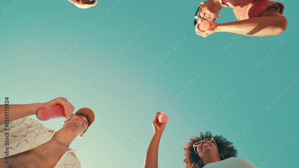 Friends, hands and cheers drinks with celebration for beach party, travel reunion or summer adventure. Low angle, blue sky and people in circle with alcohol outdoor for toast, social event or bonding