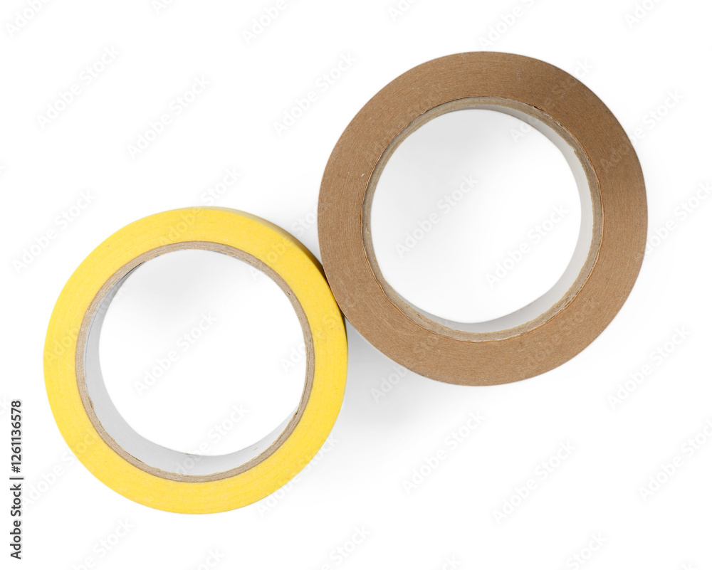 Rolls of adhesive and masking tapes isolated on white, top view Rolls of adhesive and masking tapes isolated on white, top view