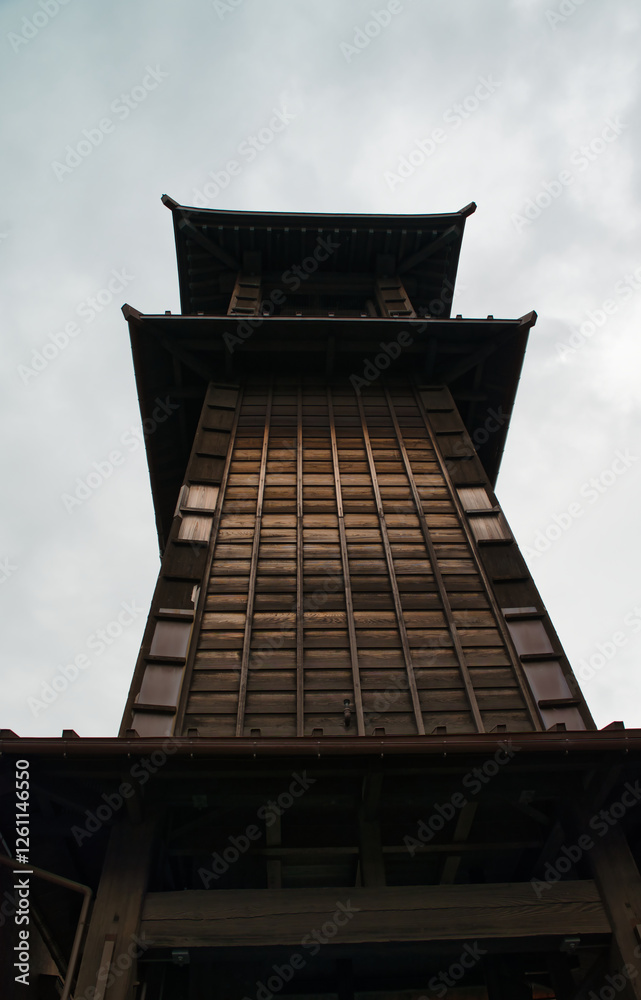 Vertical front view photograph of the bell tower (Toki no Kane) in the historic warehouse district of Kawagoe, Saitama Prefecture, Japan Asia.
Vertical front view photograph of the bell tower (Toki no Kane) in the historic warehouse district of Kawagoe, Saitama Prefecture, Japan Asia.