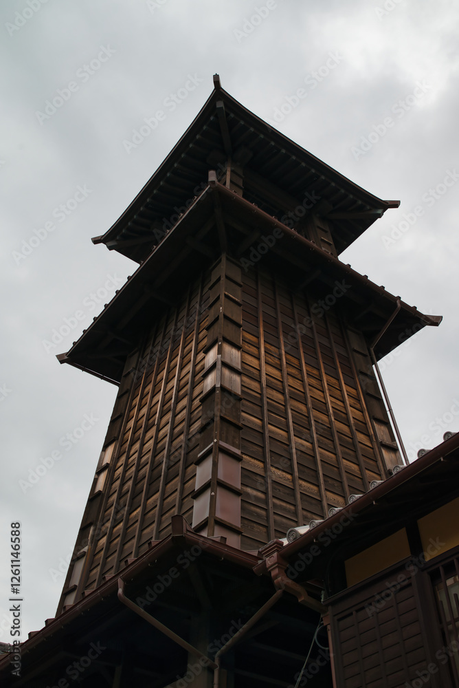 Vertical front view photograph of the bell tower (Toki no Kane) in the historic warehouse district of Kawagoe, Saitama Prefecture, Japan Asia.
Vertical front view photograph of the bell tower (Toki no Kane) in the historic warehouse district of Kawagoe, Saitama Prefecture, Japan Asia.