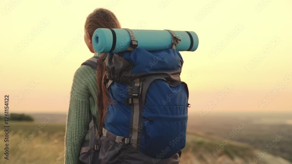 girl with backpack traveling at sunset, hiking person, lidi adventure nature, solo traveler on a trail, captivated by the sunset, sunset serenity, wanderlust at twilight, the allure of the sunset