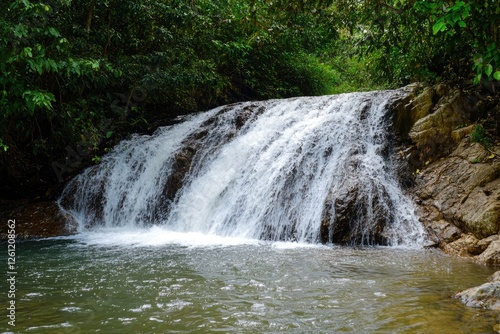 Stunning View of Ekom Waterfall Cascades in Cameroon, Embracing Nature's Beauty Amidst Lush Jungle Landscapes