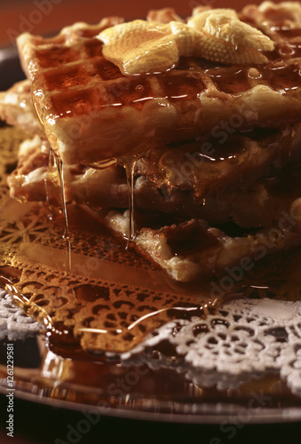 Waffle stack with dripping syrup photo