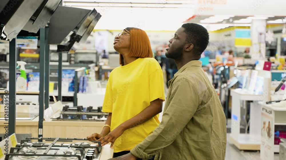 custom made wallpaper toronto digitalAfrican American couple choosing a gas stove on Black Friday