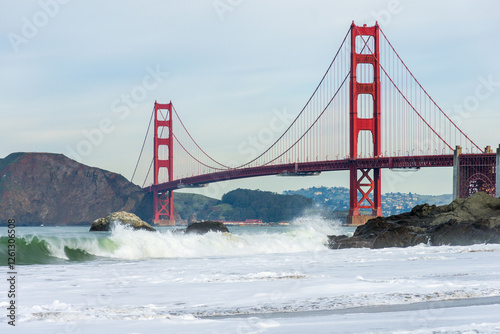 Surf in front of Golden Gate Bridge worldwide known symbol of California