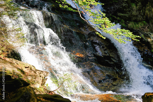 Majestic Waterfall Cascading Over Rocky Cliffs in Scenic Bavarian Nature