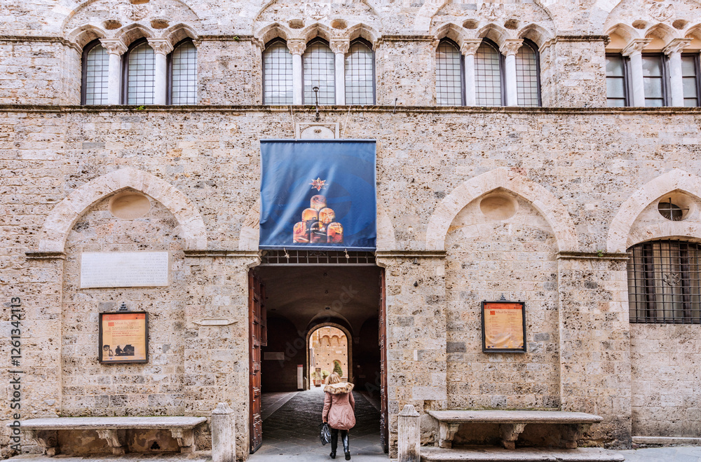 Fototapeta premium The Palazzo Chigi-Saracini is a Gothic urban palace located on the Via di Citta in central Siena. It was built by the Marescotti family in the 12th century. Siena, Italy 2019.