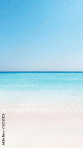 serene beach scene with clear blue water and bright sky
