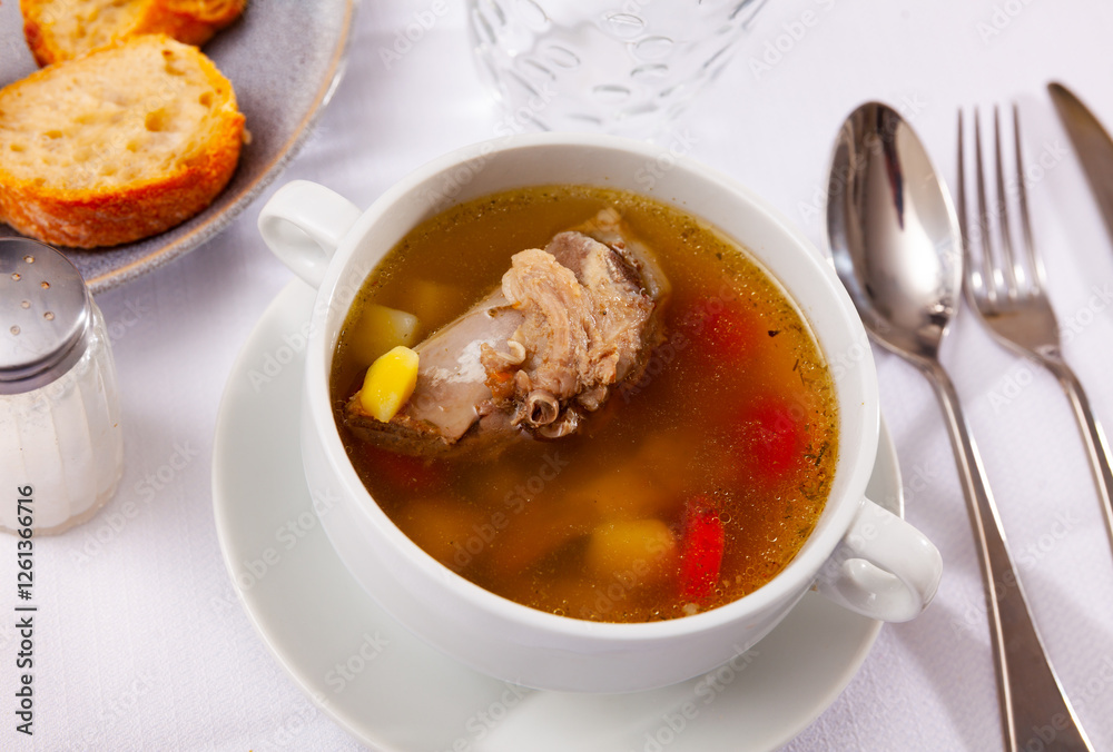 Delicious thick rustic style soup cooked in meat stock with pork and vegetables. Delicious thick rustic style soup cooked in meat stock with pork and vegetables.