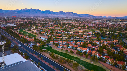 Photography Aerial of Suburban Las Vegas Golf Course and Cityscape at Sunset