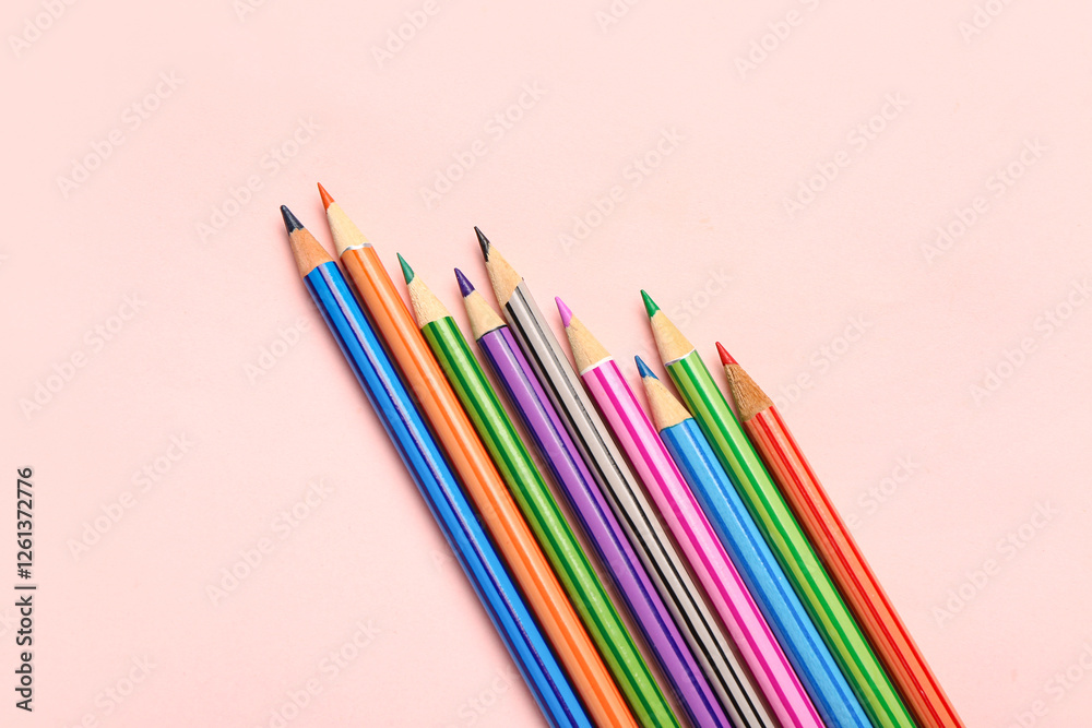 Fototapeta premium Group of colorful pencils on pink background