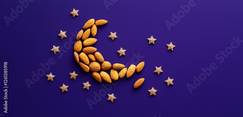 A crescent moon and stars made of dates and almonds, delicately arranged on a deep purple background.
