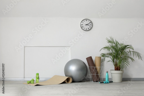 Interior of gym with fitbal...