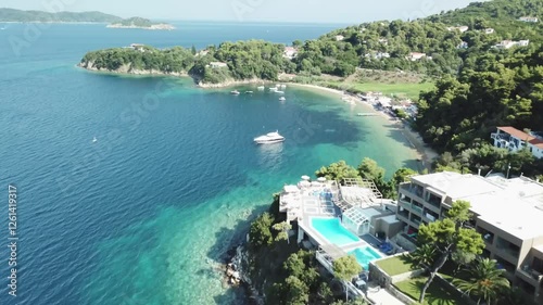 Stunning coastal views of luxury vacation property with serene surroundings and vibrant blue waters