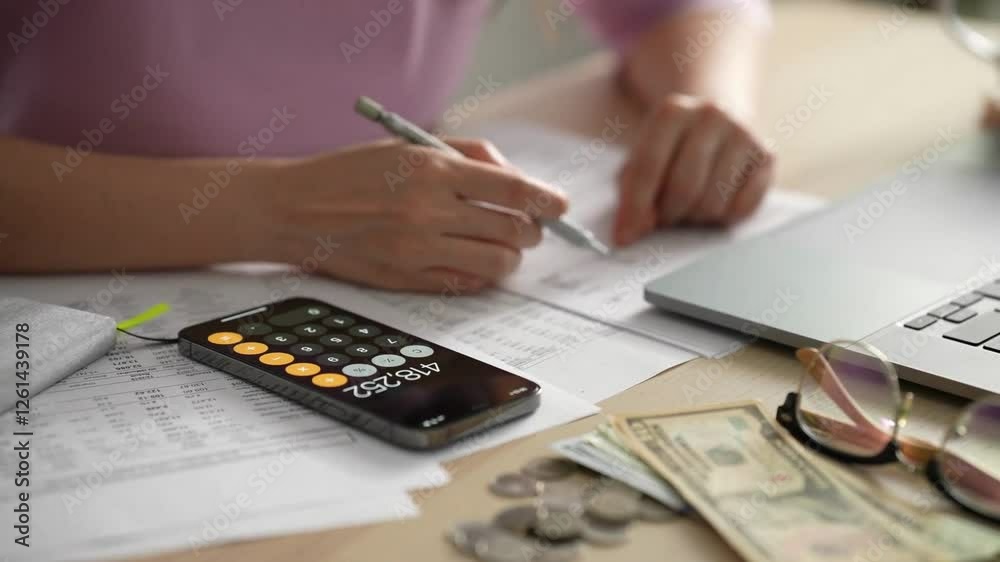 Businesspeople or accountant using calculator and laptop for calculating finance on desk office. business financial accounting concept