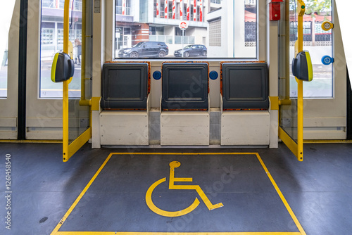 Принти на полотні Designated wheelchair accessible space marked with a disability symbol on a tram in Melbourne