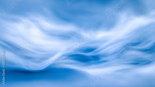 Abstract blue cloudscape with gentle swirls and soft flowing movements creates a dreamy ethereal ambiance