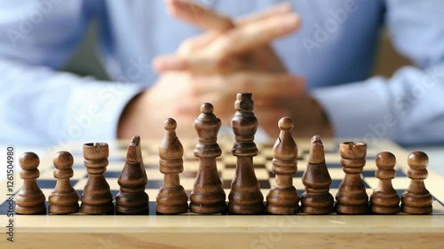 Wallpaper Mural business man with chess pieces on wooden chessboard. Strategy idea Competition leadership checkmate Torontodigital.ca