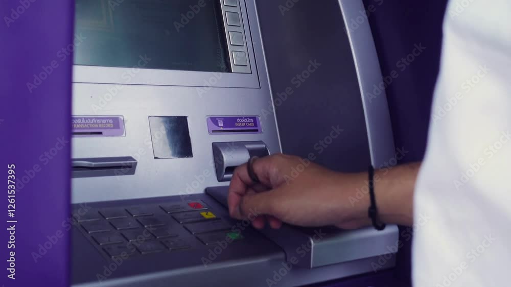 man hand entering PIN or pass code on ATM, bank machine secure keypad banking finance security man hand entering PIN or pass code on ATM, bank machine secure keypad banking finance security