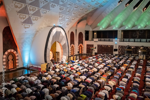 Hundreds of Muslims are praying prostration and praying together at the Great Mosque of West Sumatra or masjid raya sumatra barat, Indonesia photo