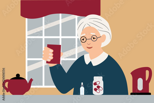 Elderly woman in the kitchen taking her medicine with a glass of water in the kitchen at home
